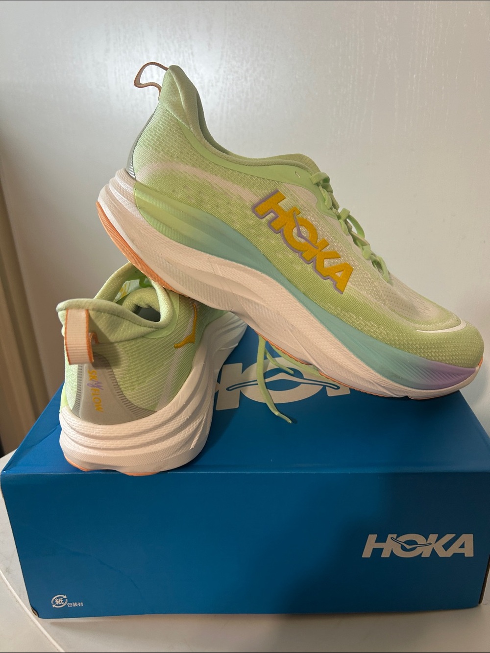 Hoka sky flow Pastel Green Athletic Running Shoes with Yellow Logo